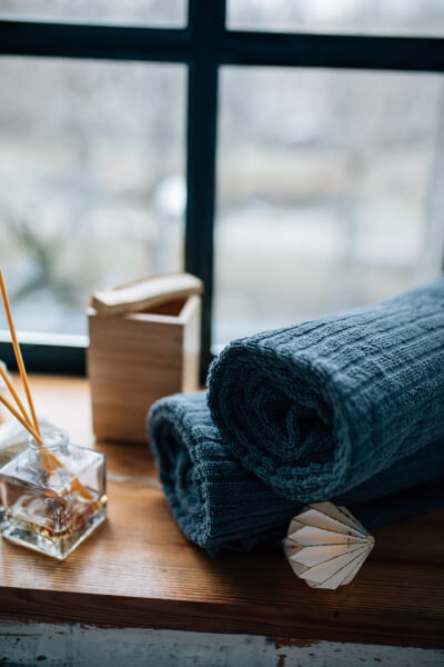 Freshly folded towels stacked neatly